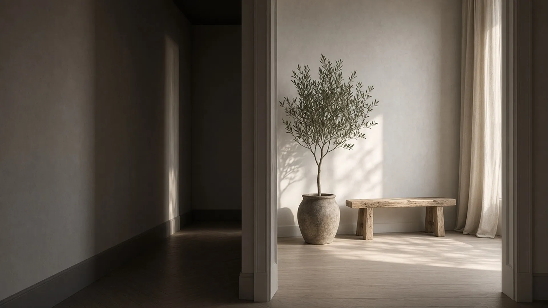 An open doorway onto a bright, tidy room with a bare wood bench inside